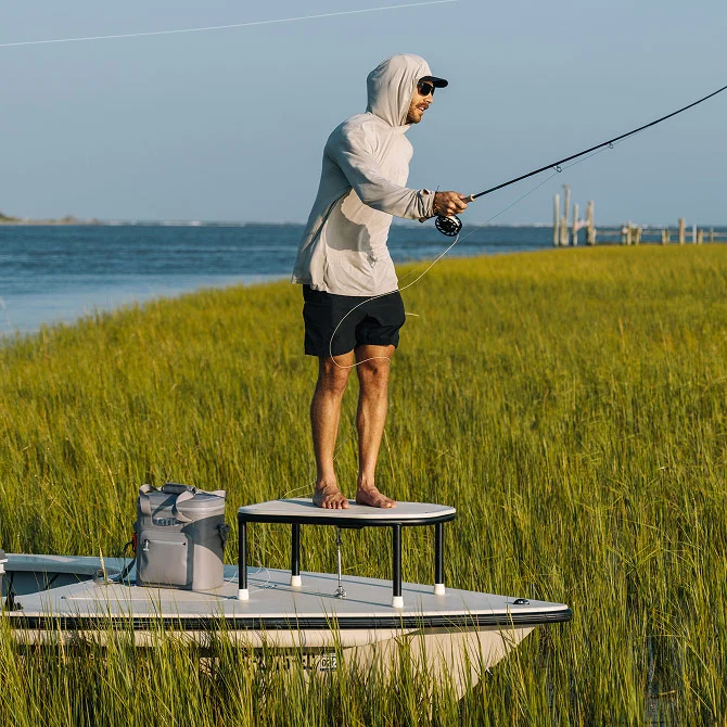 Fisherman casting off a boat.